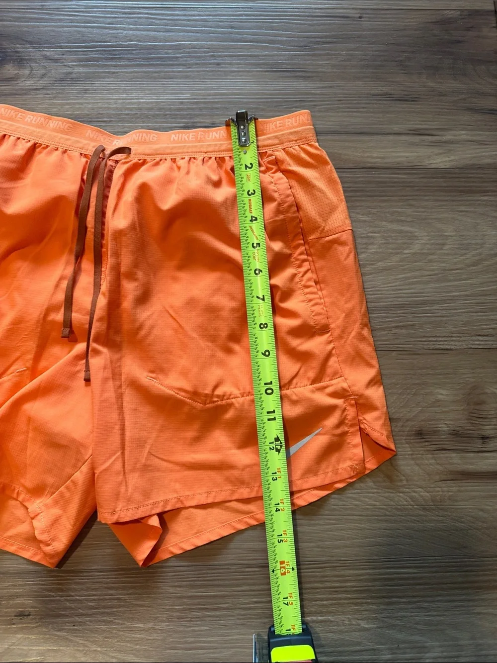 Nike Orange Athletic Running Shorts with Reflective Swoosh